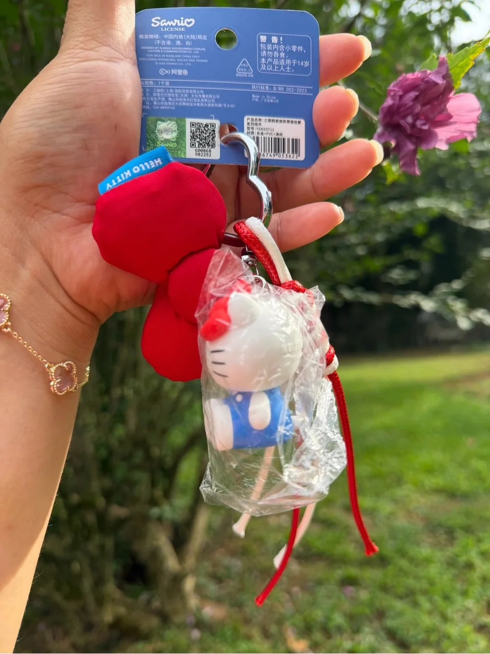 Sanrio Hello Kitty Red Bow and Blue Outfit Key Charm